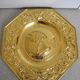 Offering dish in embossed brass by François I