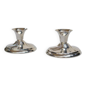 Pair of silver metal candlesticks