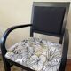 Black wooden armchair with golden leaves