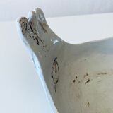 Large empty pocket or cup made of bird ceramic