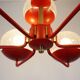 1960s chandelier, red metal and brass, 9 crackle glass shades
