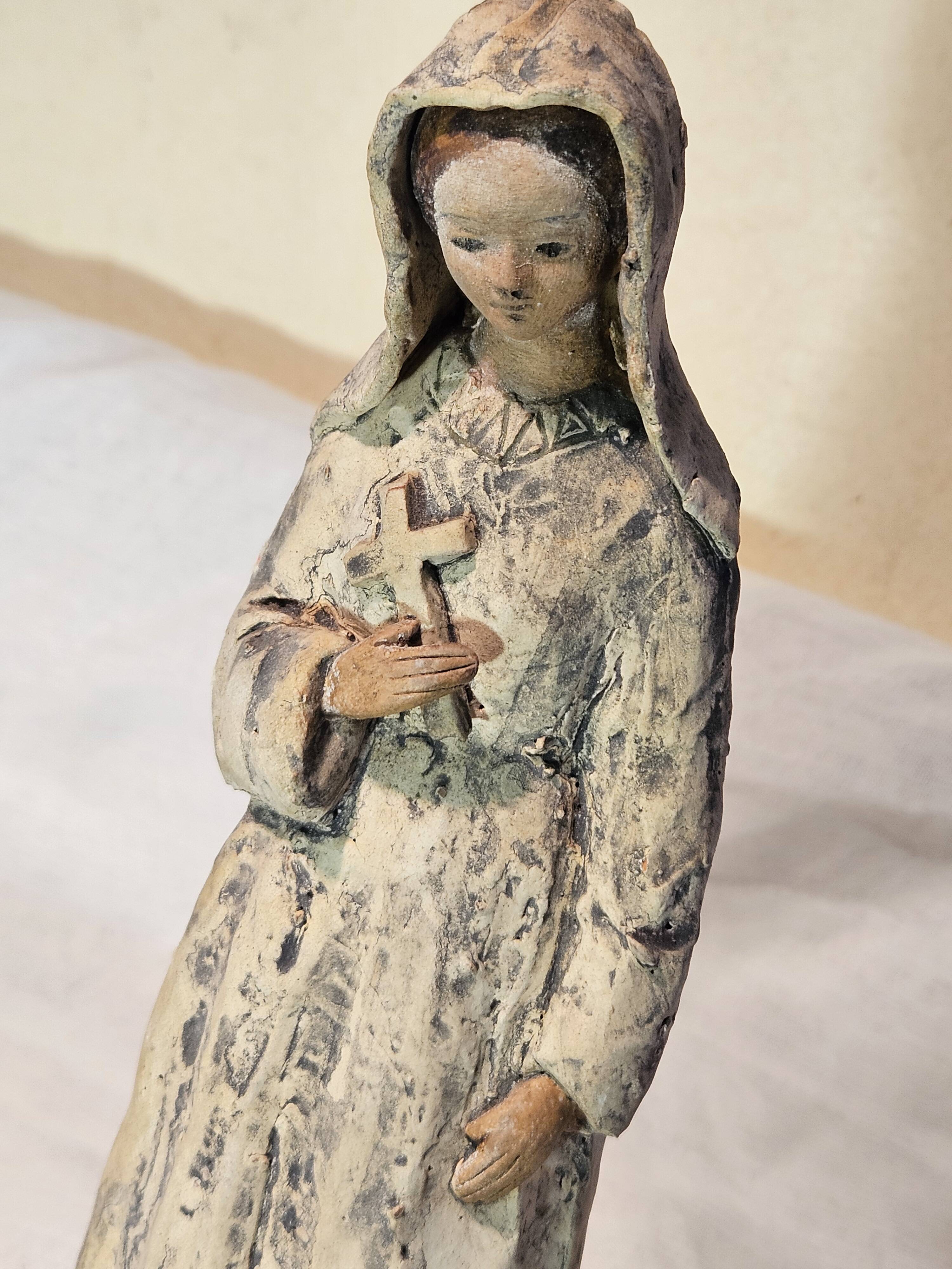 Painted terracotta holy virgin statue