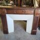 Facade of antique wooden fireplace