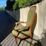 Fauteuil Voltaire XIX ème siècle, en noyer d'époque Louis Philippe, récemment recouvert.