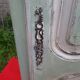 Antique patinated bonnet maker