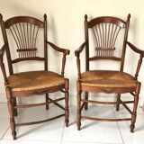 Pair of straw and cherry armchairs