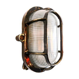 Antique Holophane wall lamp in patinated bronze