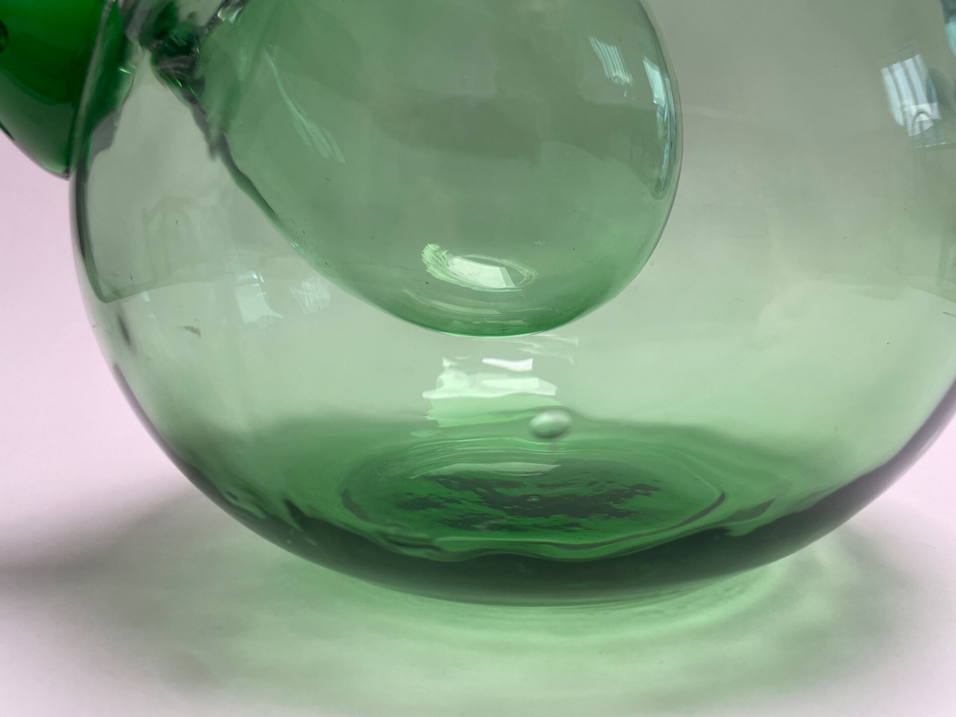 Large green glass cooling jug