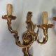 Pair of Louis XV style bronze wall sconces