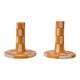 Pair of yellow and white checkered ceramic candlesticks