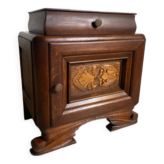Vintage art deco nightstand / bedside table in varnished oak, opening with a medallion door