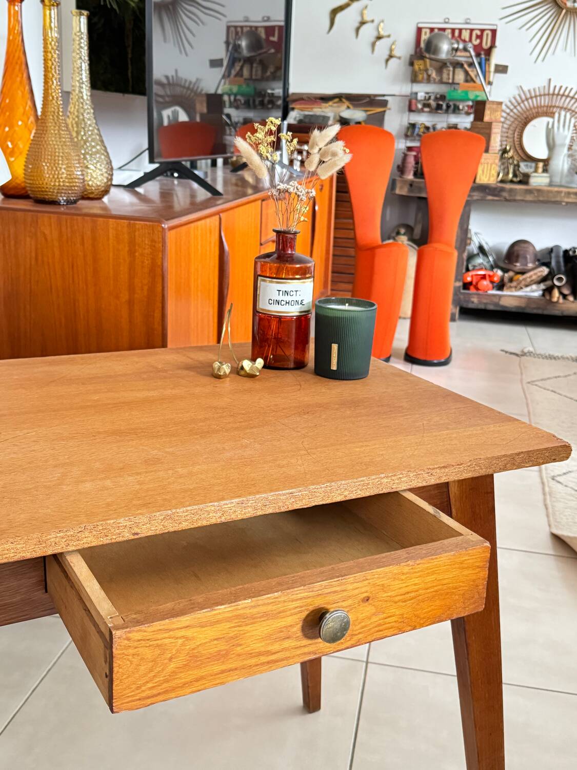 Old wooden desk or side table with compass legs