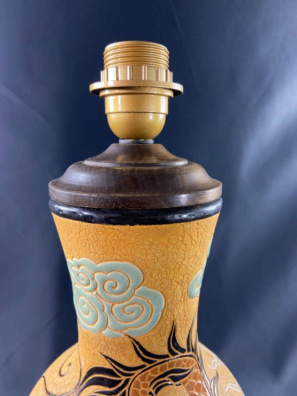 Very large dragon lamp on a yellow background in well-fired Vietnamese stoneware.