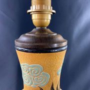 Very large dragon lamp on a yellow background in well-fired Vietnamese stoneware.