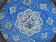 Decorative plate in blue enameled metal with bird motifs