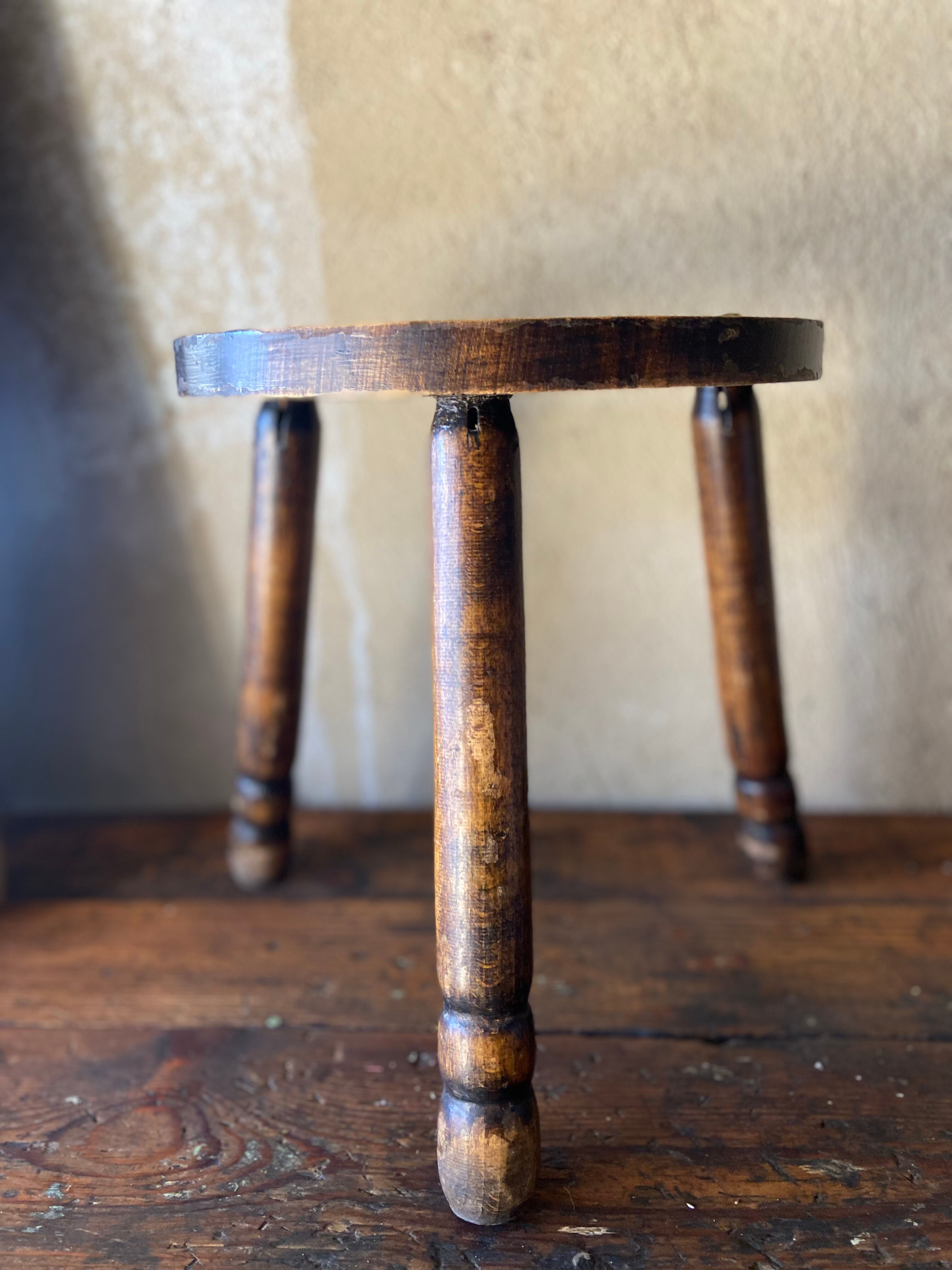 Rustic tripod stool