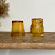 4 mismatched amber glasses