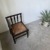 Straw chair by the fireside 1900