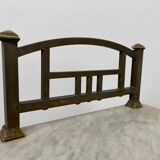 Brass bedside table with a marble top.