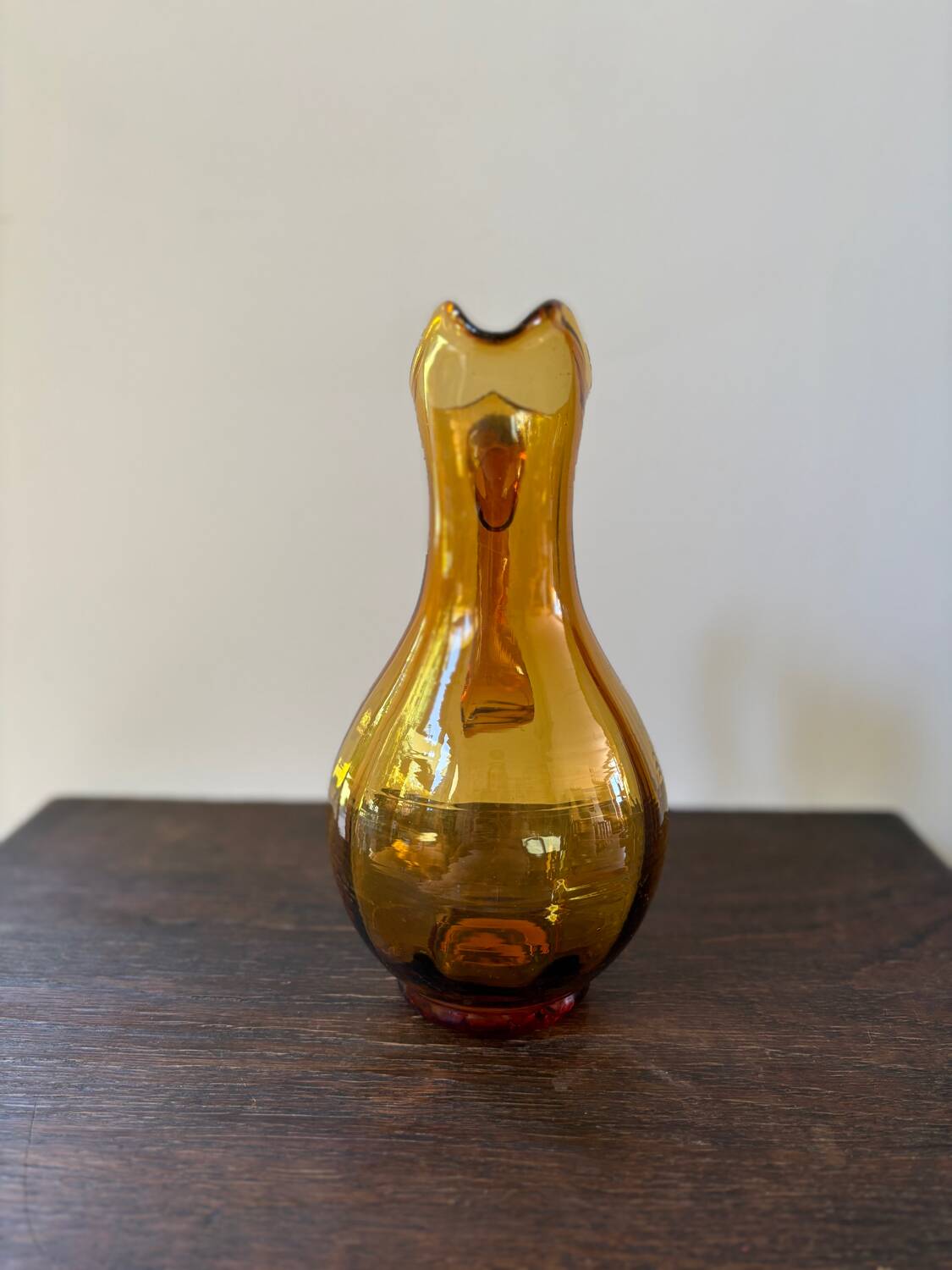 Vintage orange mouth-blown glass pitcher