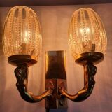 Golden bronze wall lamp with mermaids for an old bathroom.