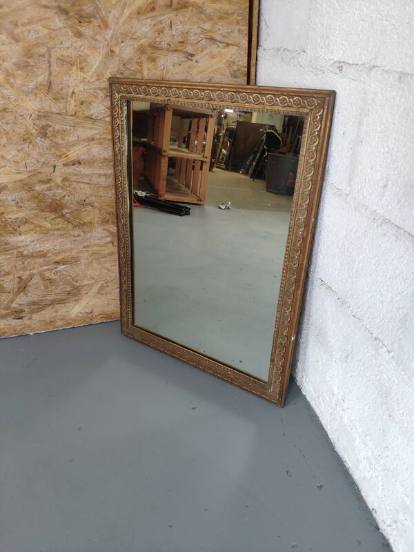 Miroir mural contour doré