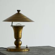 Art Deco table lamp in patinated brass from the 1940s.