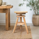 1950s solid oak tripod workshop stool with a screw mechanism.
