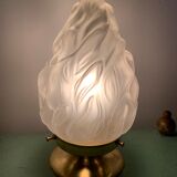 Old laying flame lamp