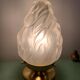 Old laying flame lamp
