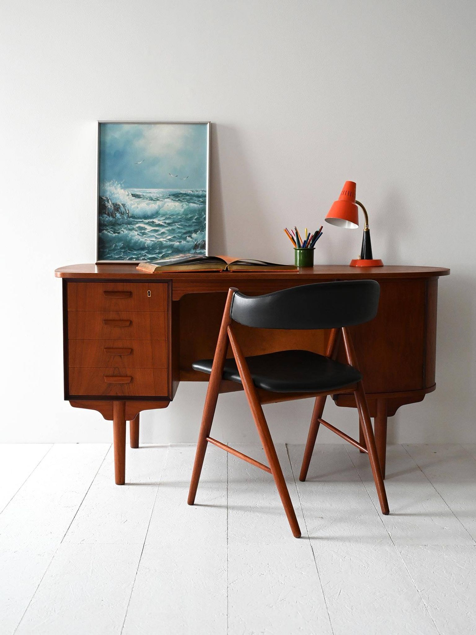 Scandinavian oval desk in teak from the 1960s.