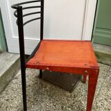 Chair with wooden seat and rare steel back