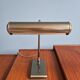 Pair of brass desk/piano lamps, 1950s-60s