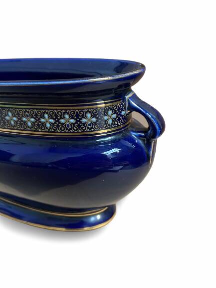 Blue earthenware planter decorated with gold motifs