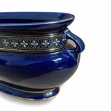Blue earthenware planter decorated with gold motifs