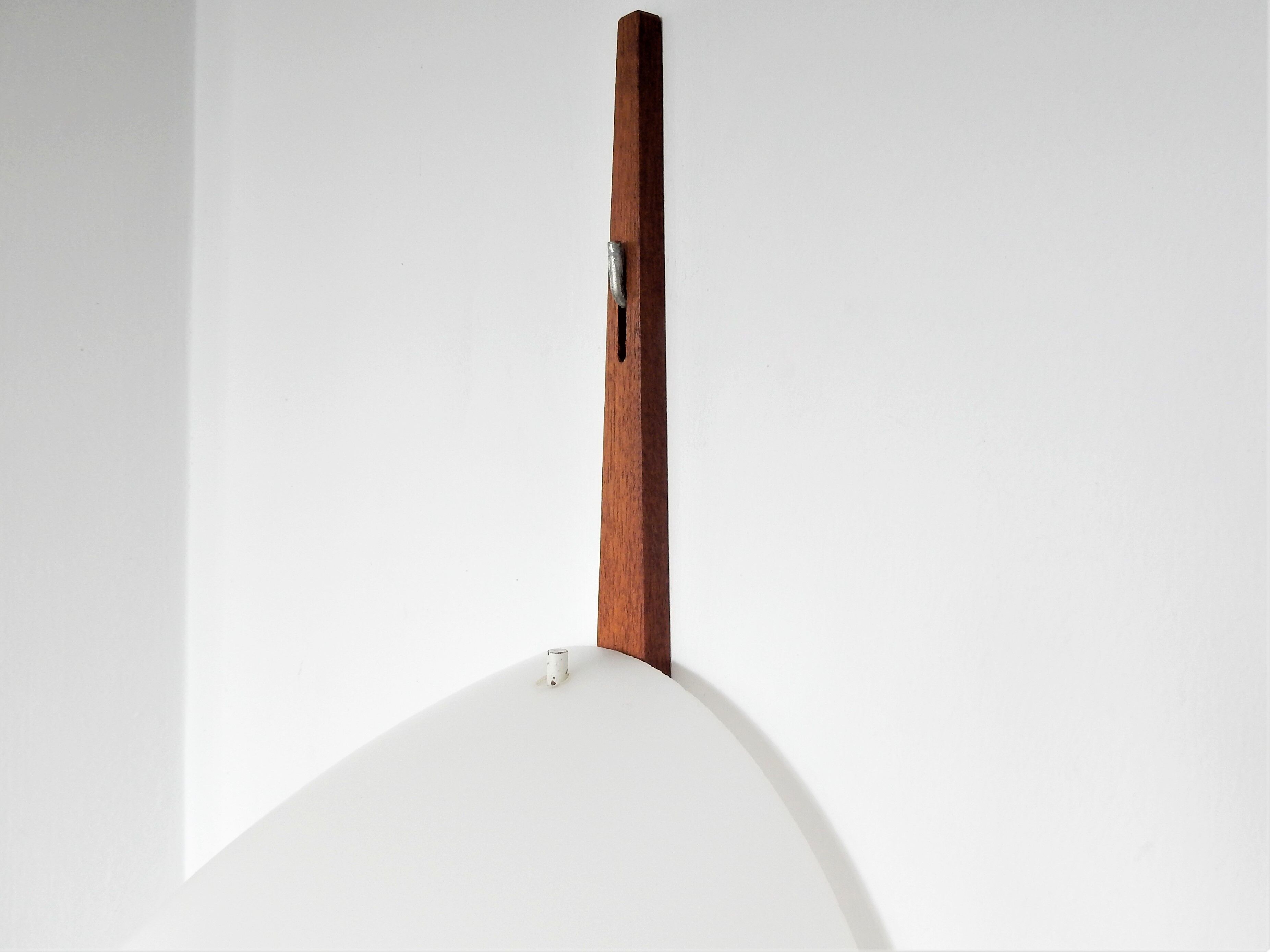 C-1575 teak and opaline glass wall lamp by Eje Ahlgren for Raak 1957