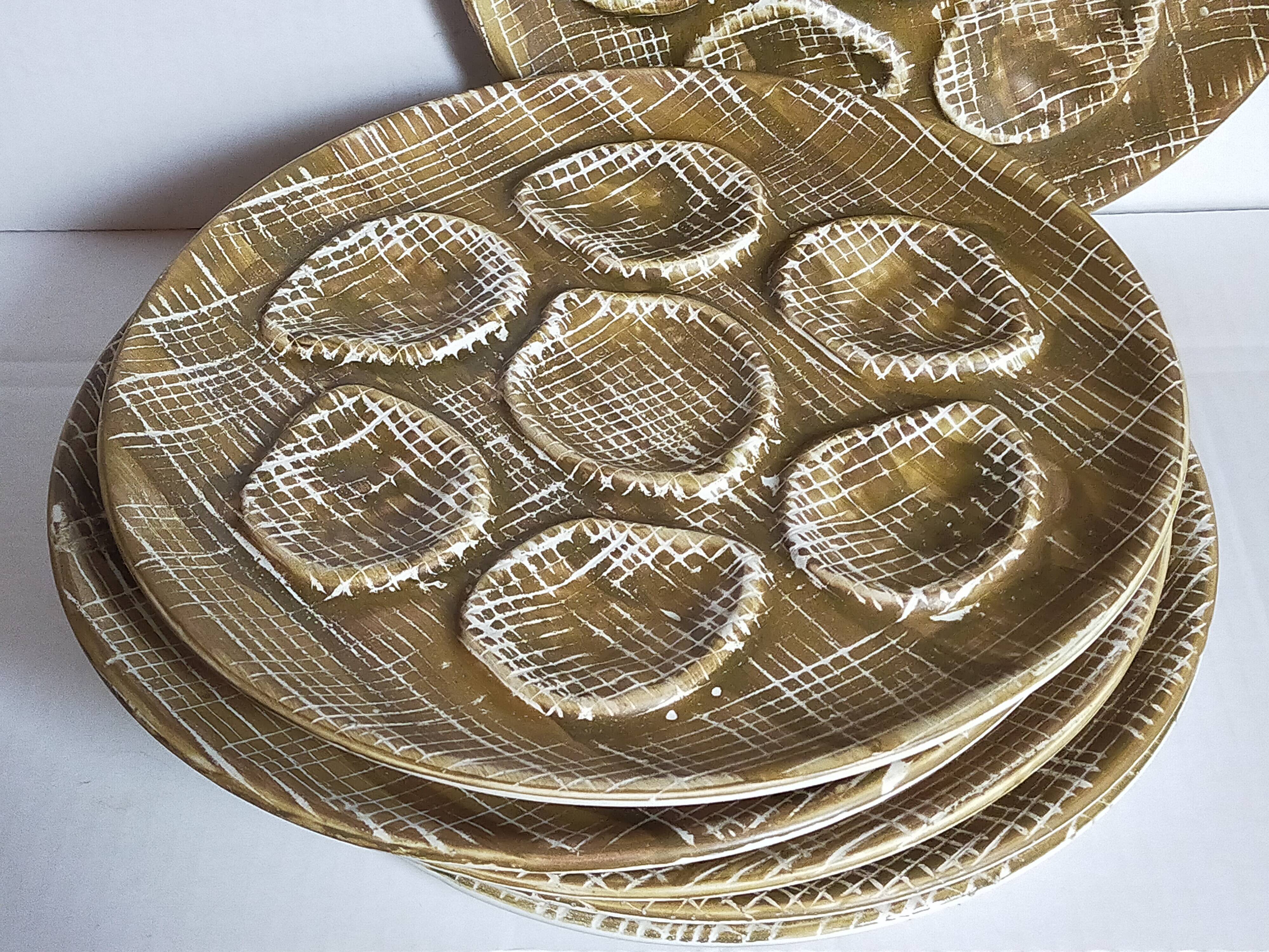 Six oyster plates earthenware with matte enamel, 50s