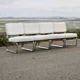4 chauffeuses formant canapé modulable. acier, simili-cuir, années 70
