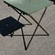 Folding garden or bistro table in khaki sheet metal from the early 1950s.