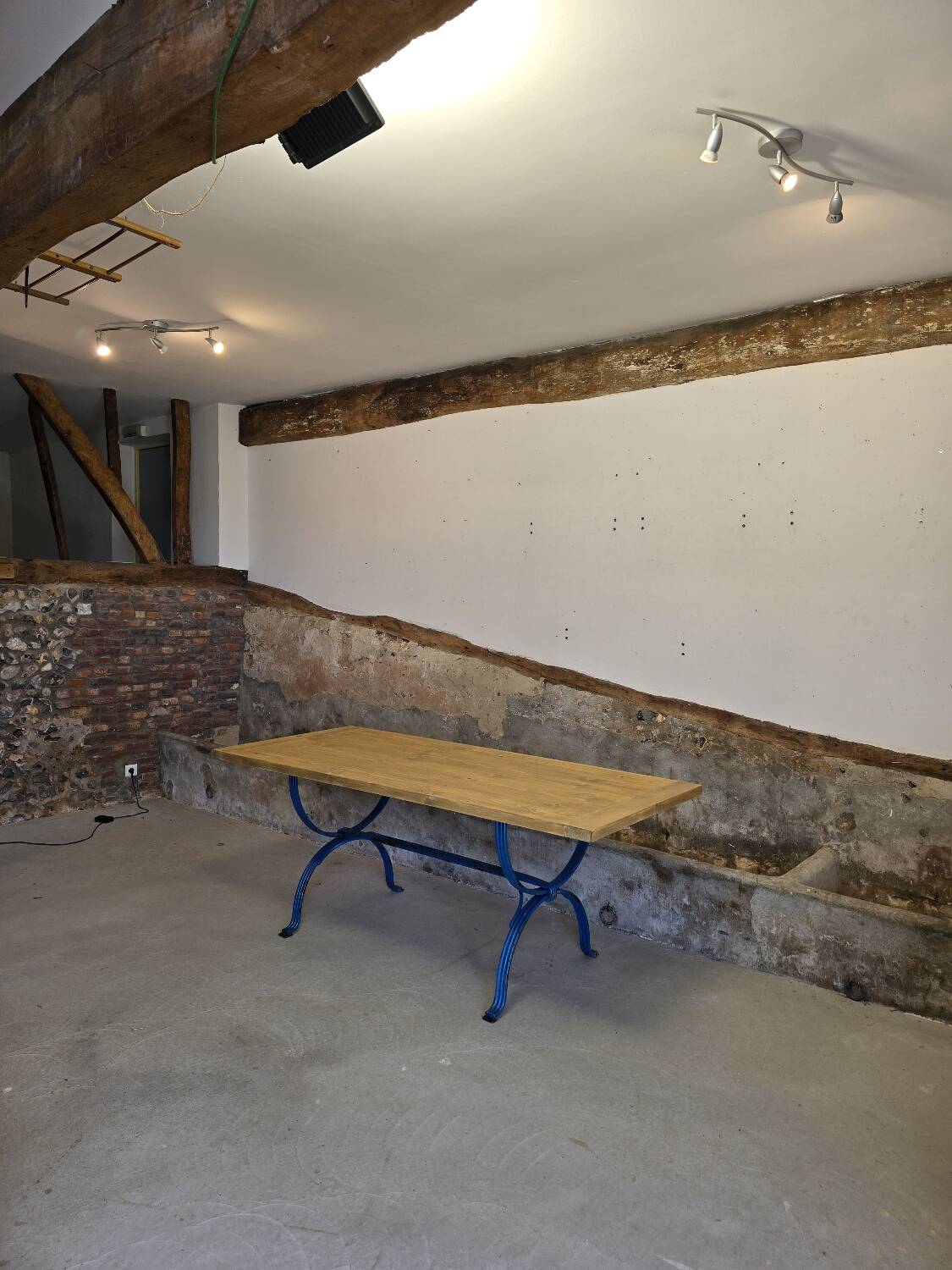 Wrought iron and solid wood table