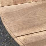 Renovated Louis Philippe round extendable dining table with leaves from the 18th century.