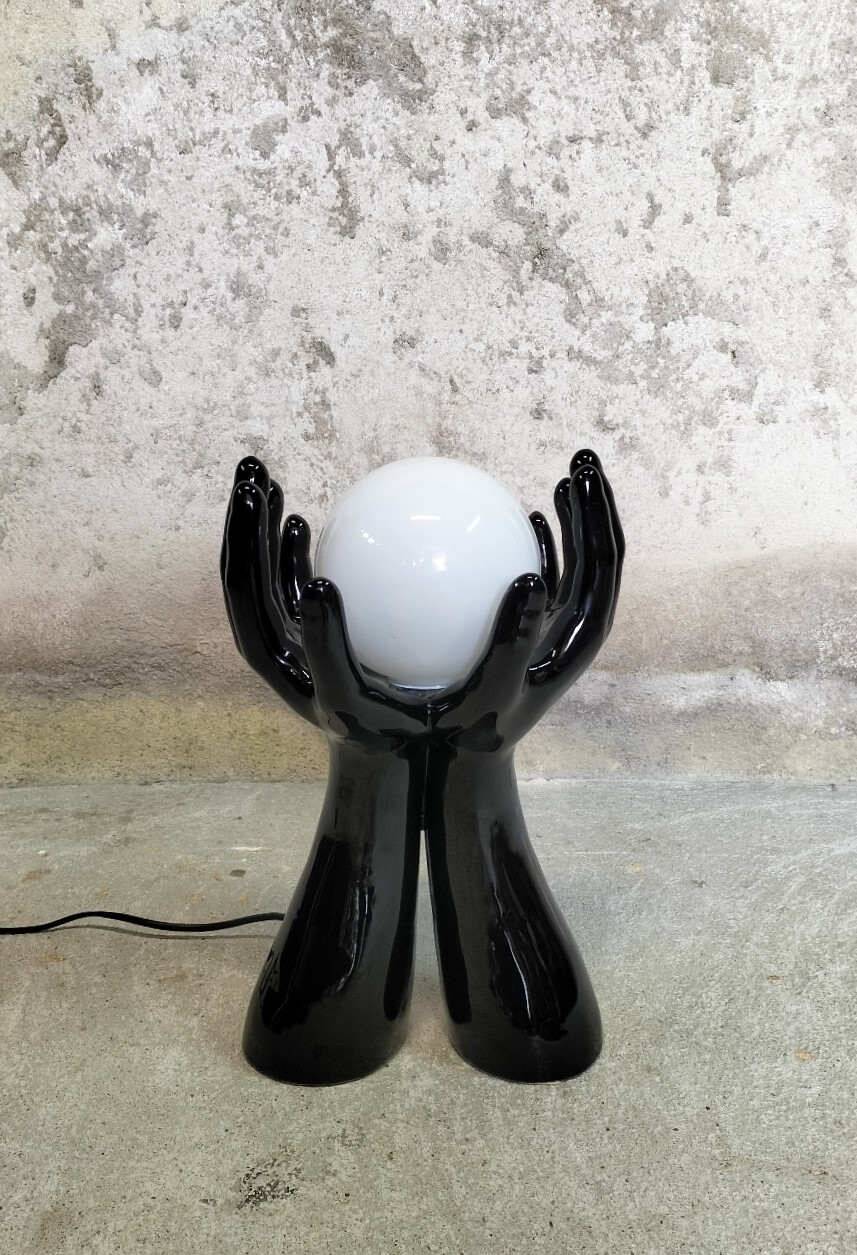 Black and white opaline hand lamp.