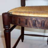 Lyre-shaped Chair bedded in natural wood with folder