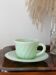 Ancienne tasse et sa soucoupe en opaline vert menthe