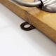 Peg wood and metal, wearing vintage coat