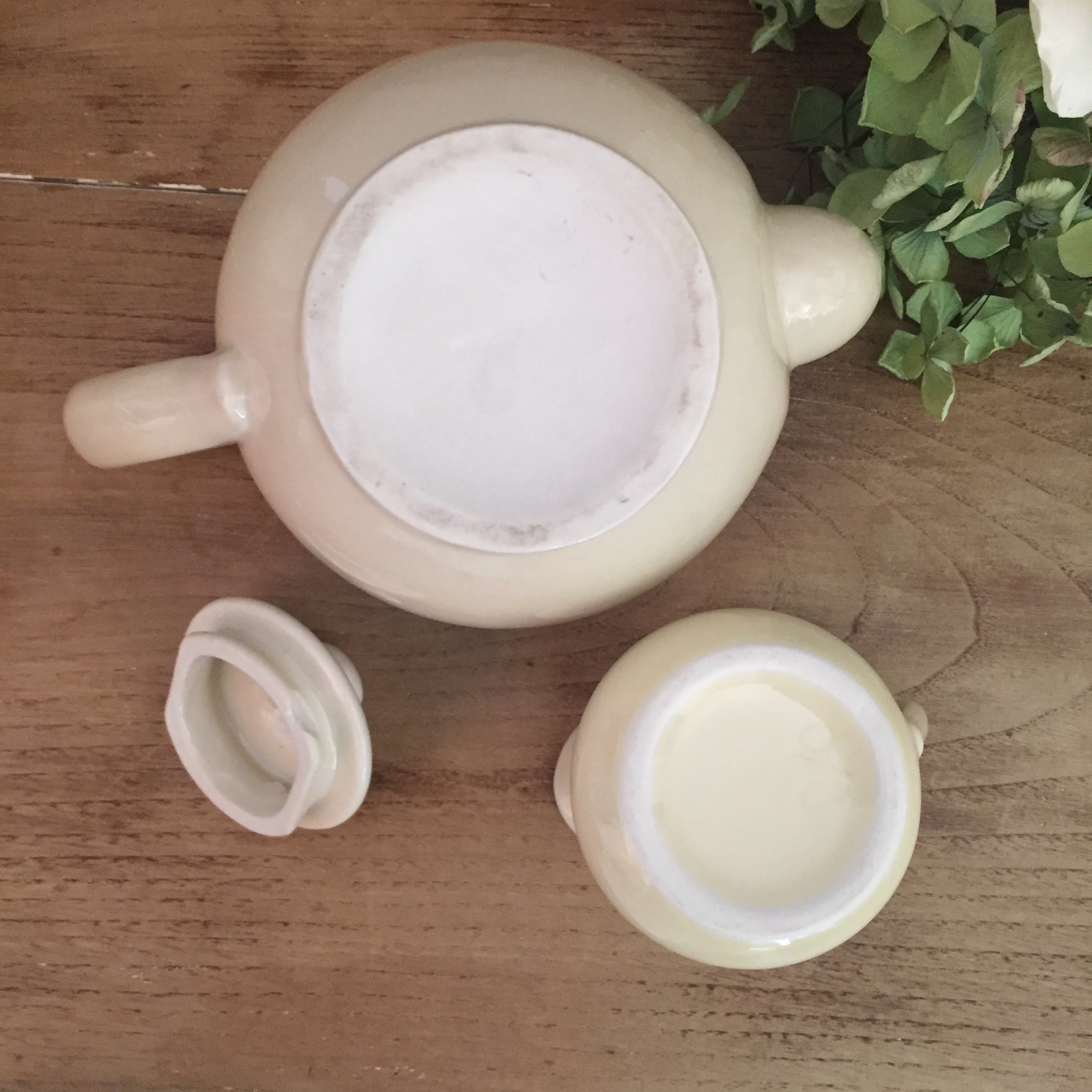 Teapot and vintage milk jar