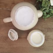Teapot and vintage milk jar