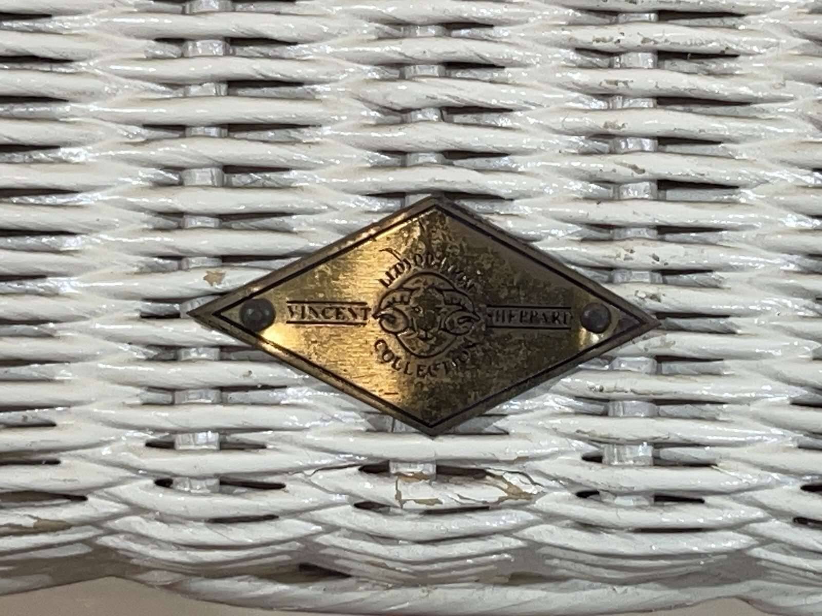 Pair of lloyd loom armchairs by vincent sheppard - work from the 2000s