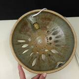 Wall lamp in openwork-vintage round sandstone shape