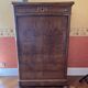 Antique secretary in flamed walnut, Louis-Philippe period.